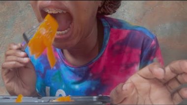 EATING MANGO SLICES WITH BRACES